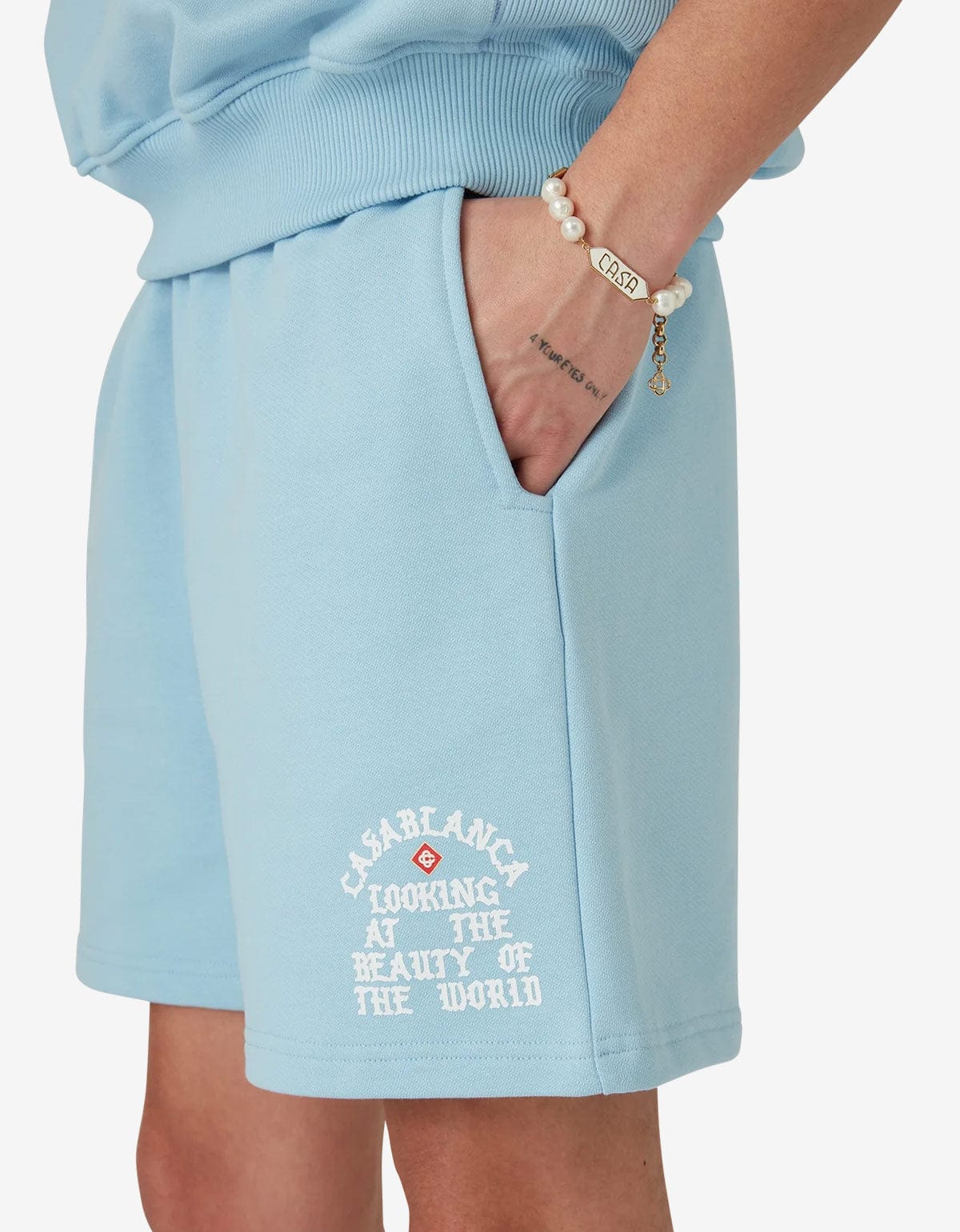 looking at the beauty of the world sweatshorts pale blue loopback